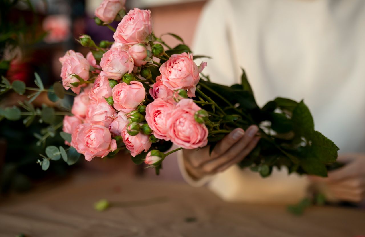 close-up-hands-holding-flowers-bouquet 1.jpg
